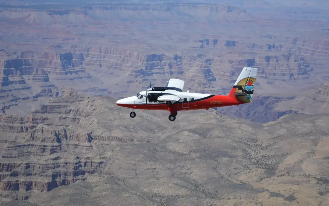 Twin Otter Airplane flying over Grand Canyon